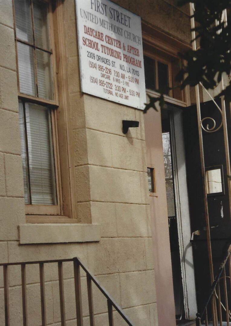 A building with a sign on the front of it.