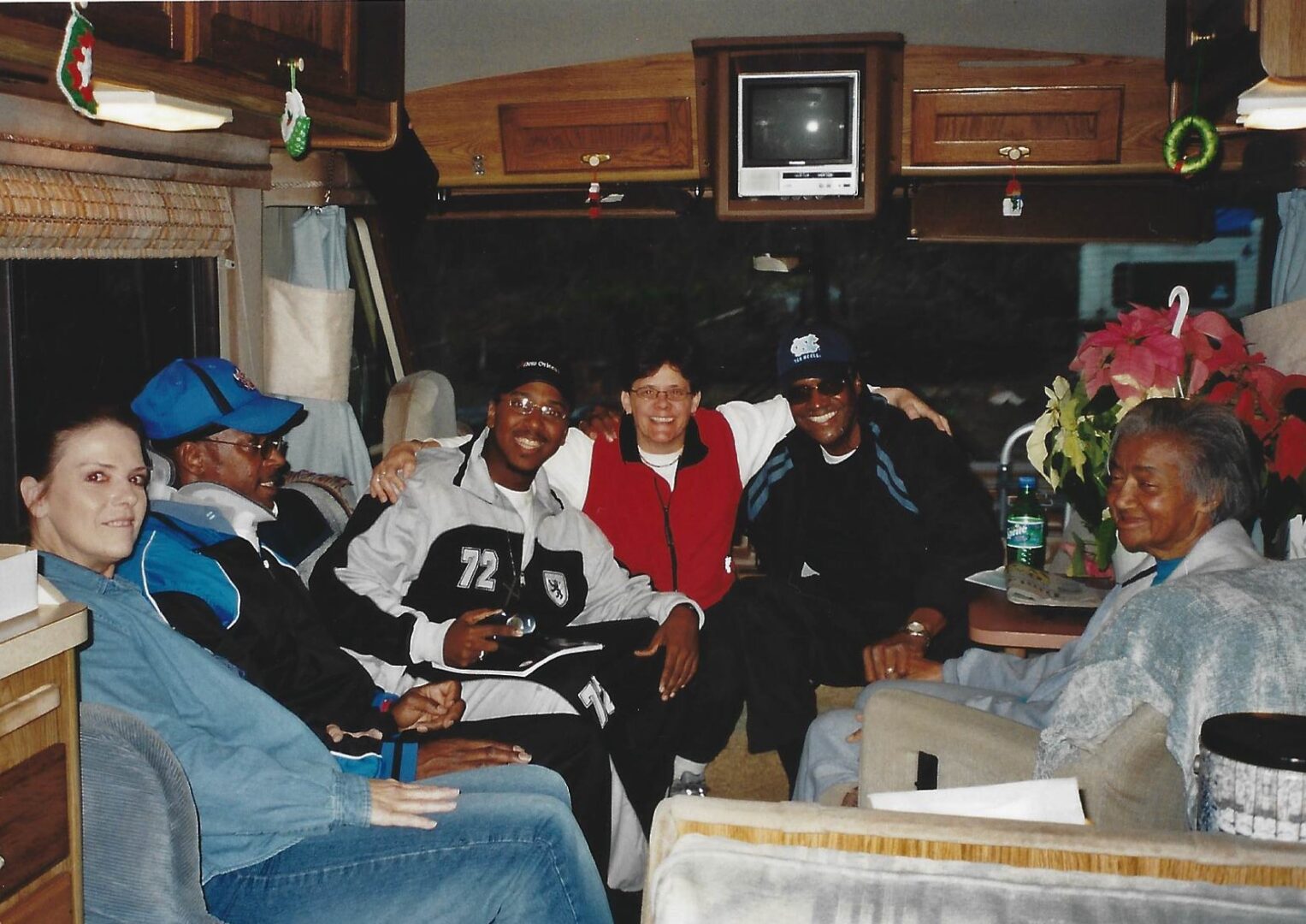 A group of people sitting around in a room.