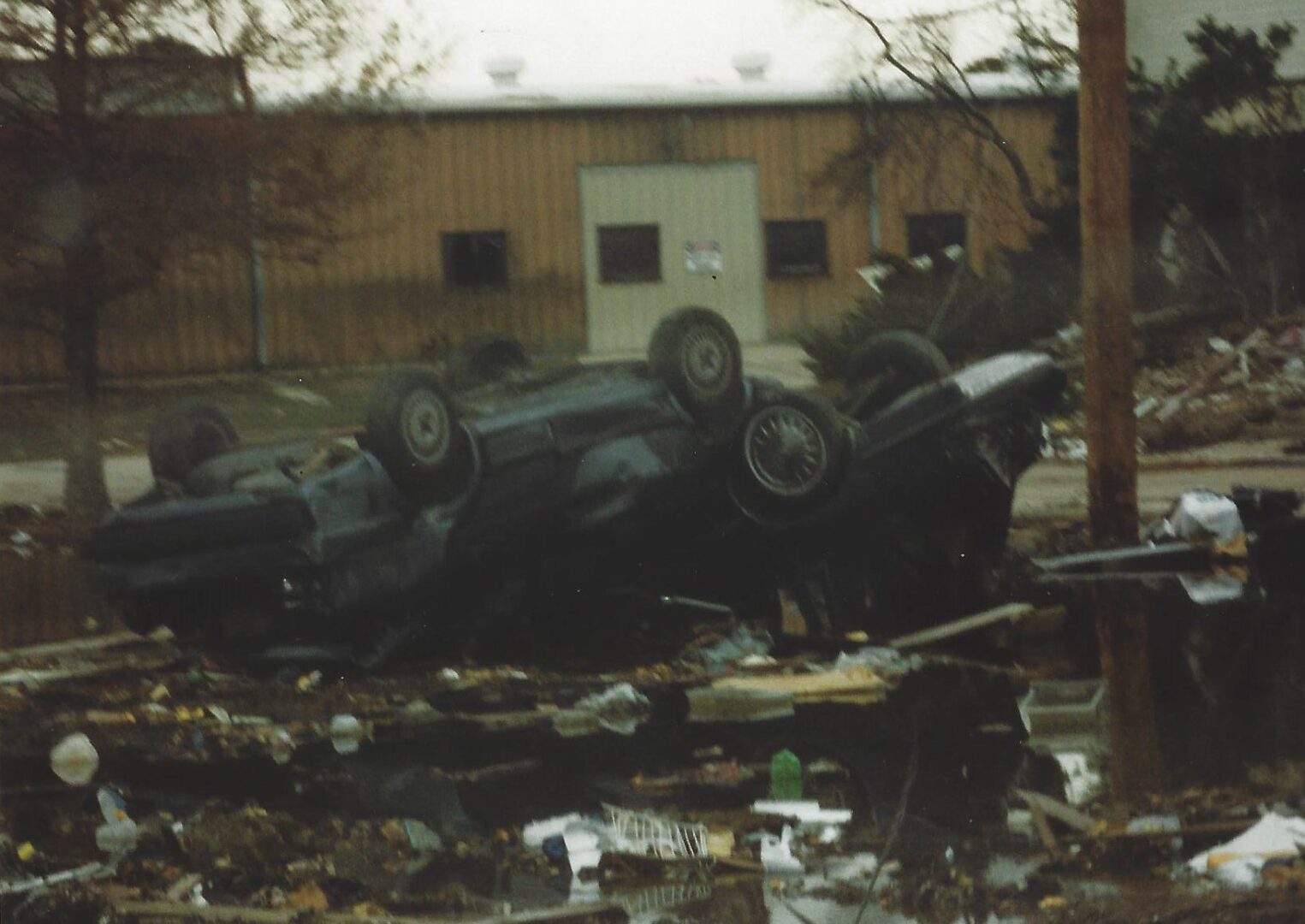 A car that is sitting on the ground.