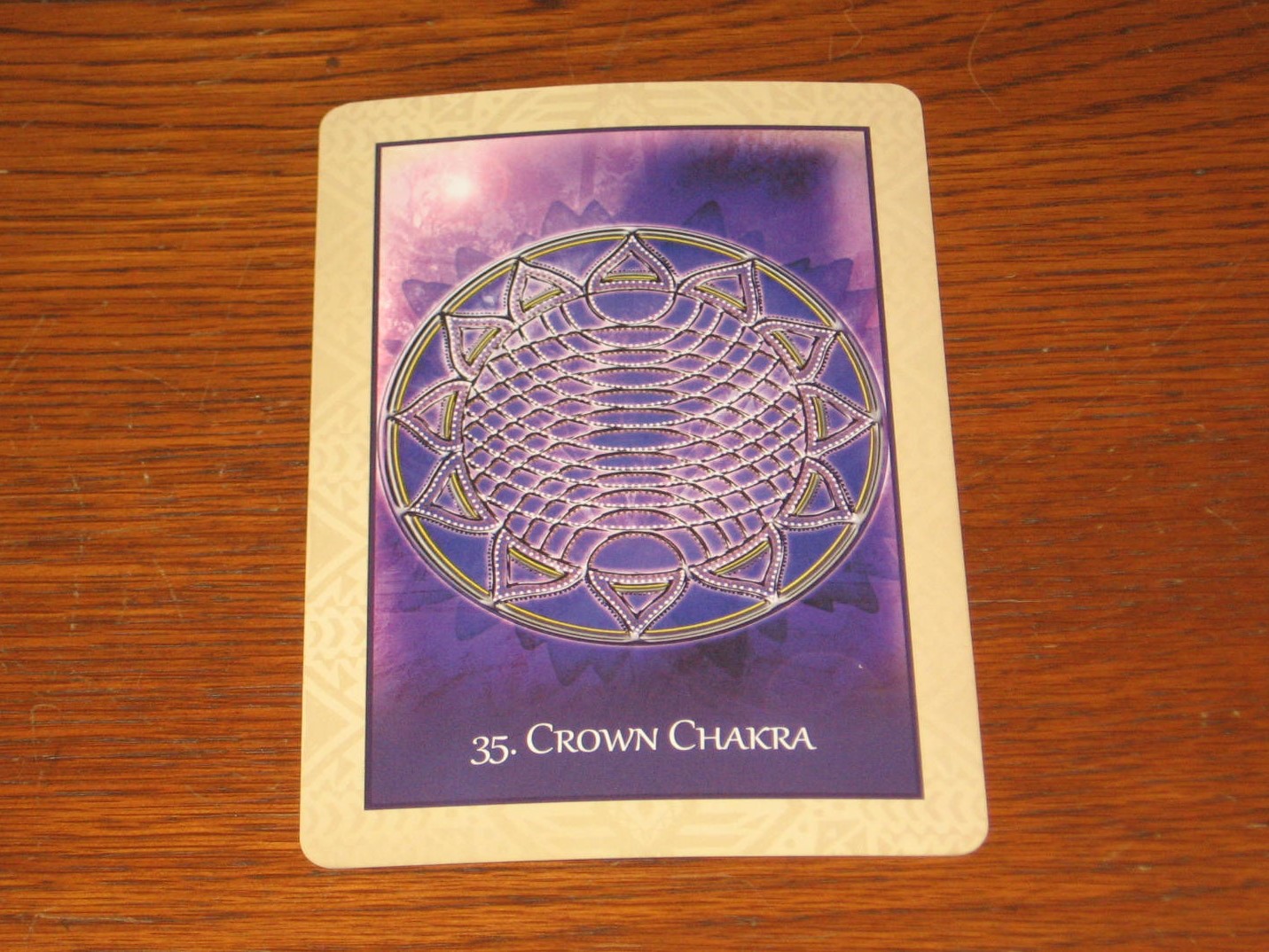 A card with the name of a crown chakra on it.