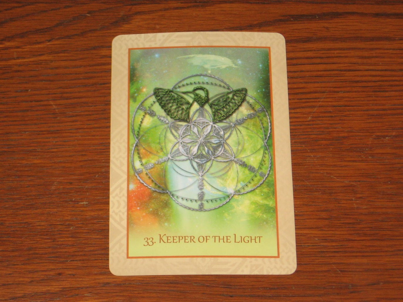 A tarot card with an image of the angel.