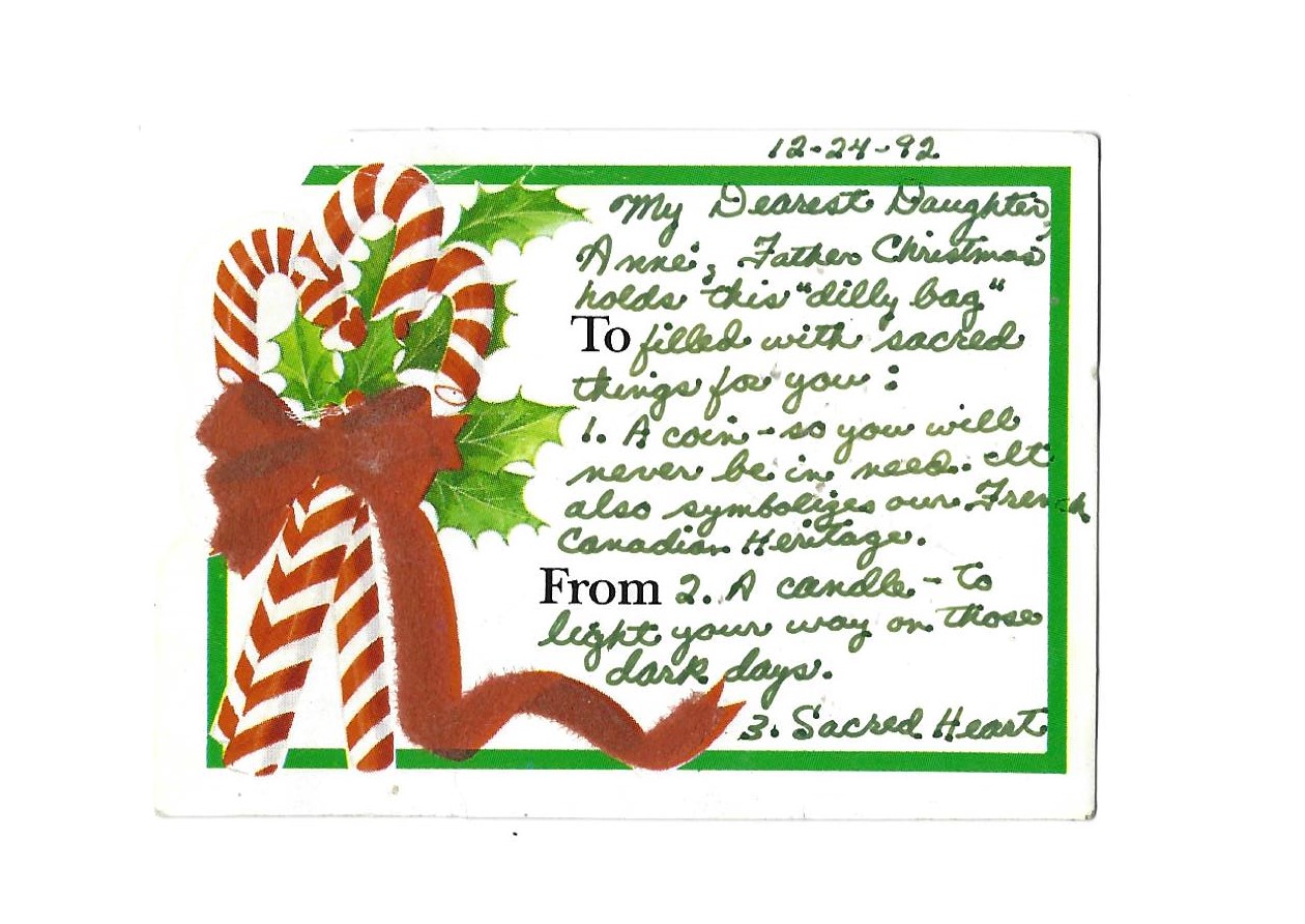 A candy cane and holly christmas card with a message.