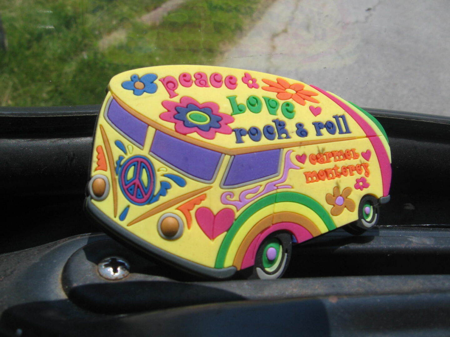 A yellow bus with many designs on it