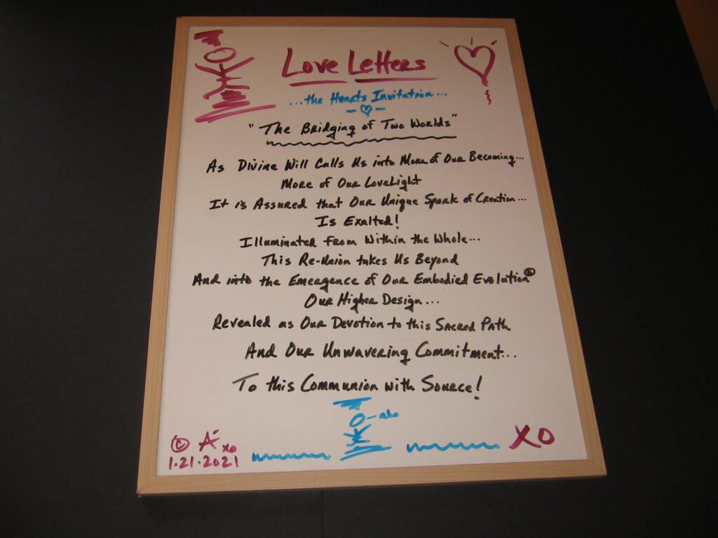 A love letter written in calligraphy on top of a table.