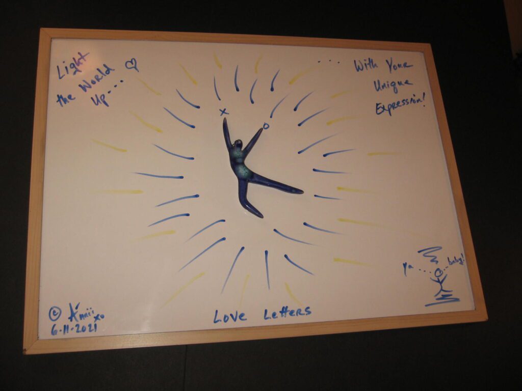 A clock with the words " love peace " written on it.