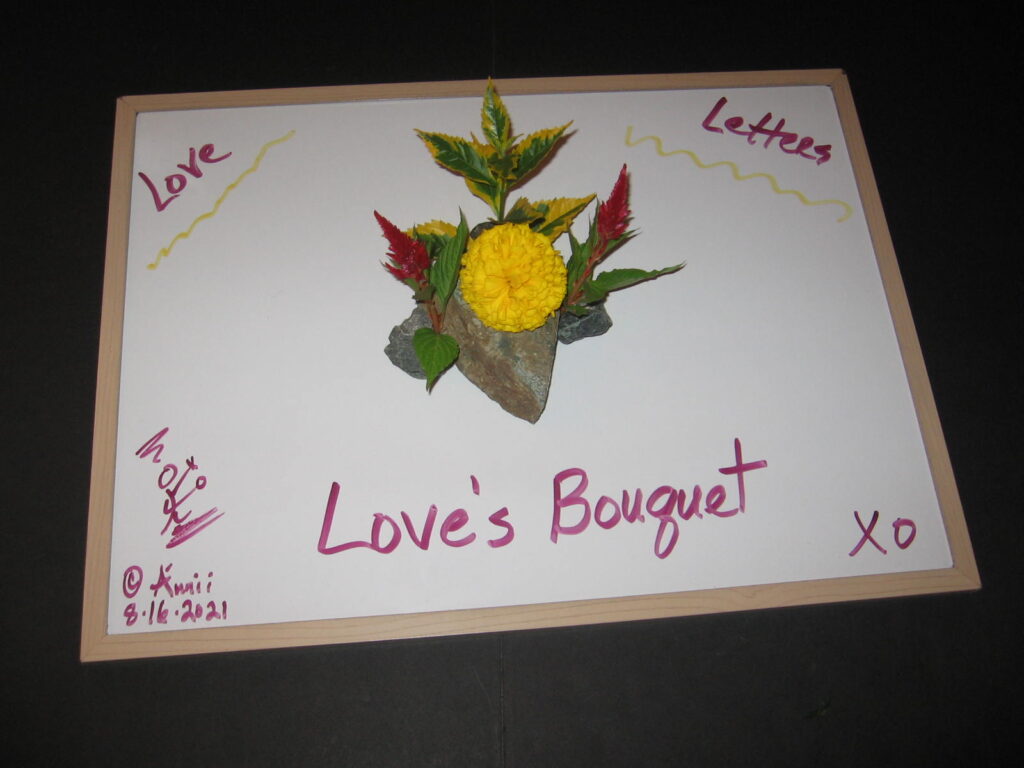 A card with the words love 's bouquet written on it.