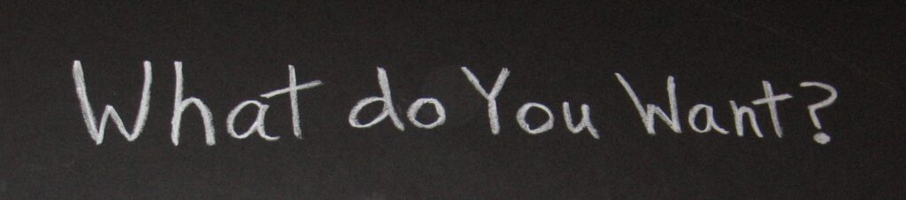 A chalkboard with the words " i do you."