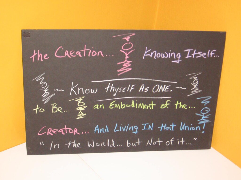 A chalkboard with the words " know thyself as one ".