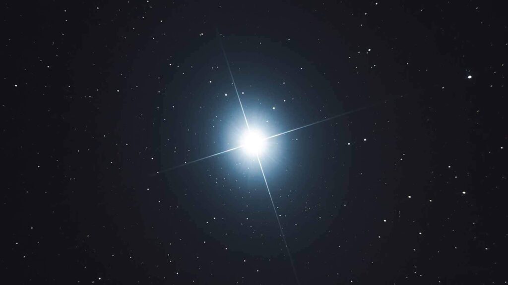 A star with a bright light in it's center.