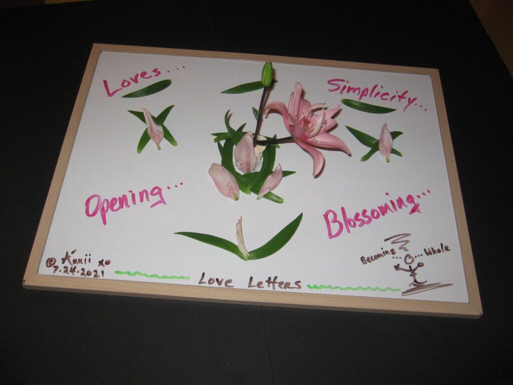 A painting of flowers with the words " love, simplicity ," " opening and blossoming."