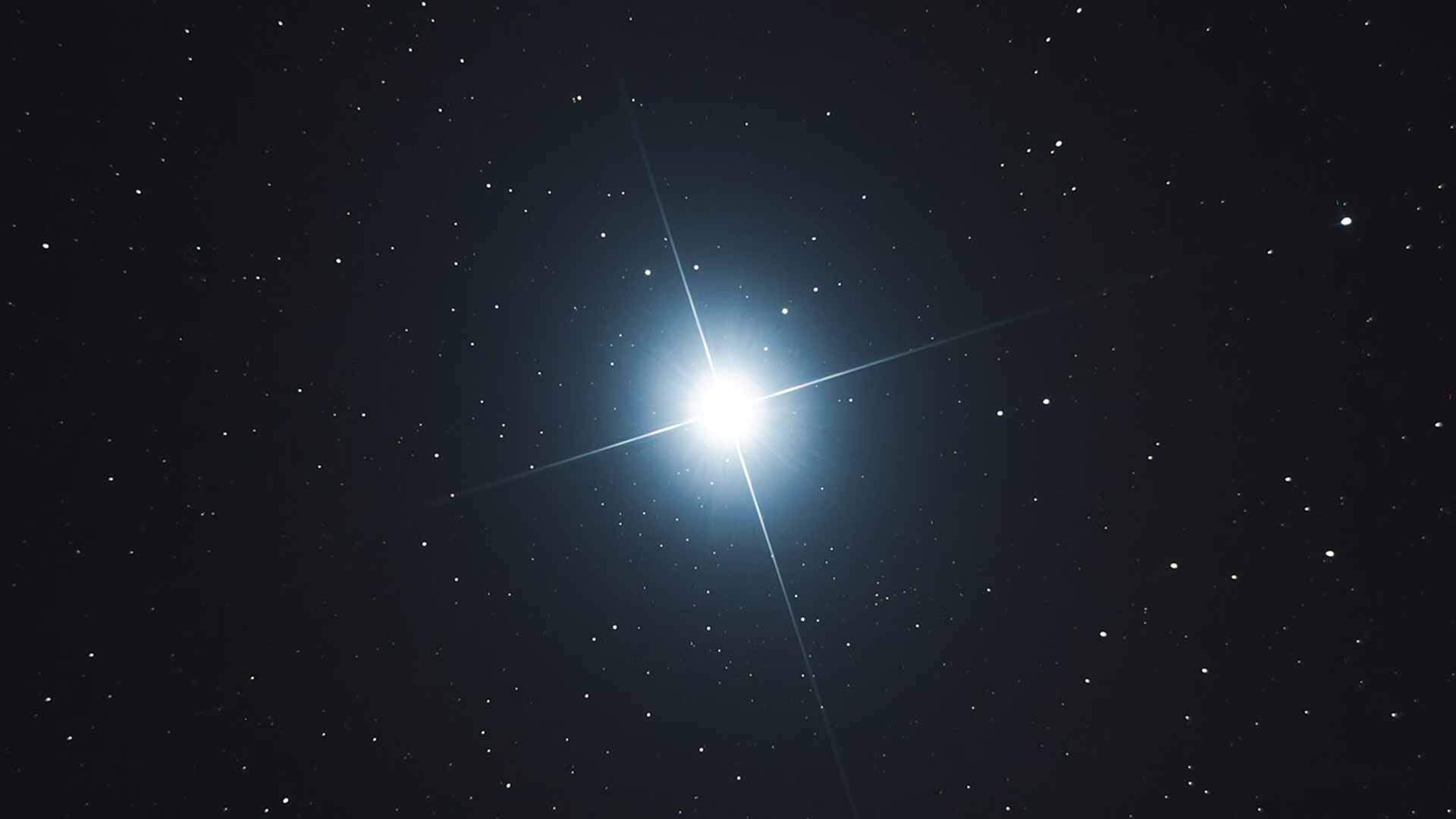 A star with a bright light in it's center.