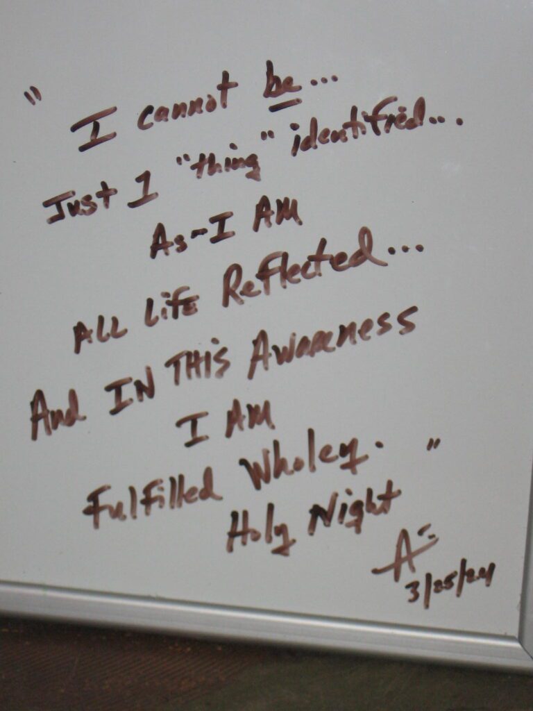 A white board with some writing on it