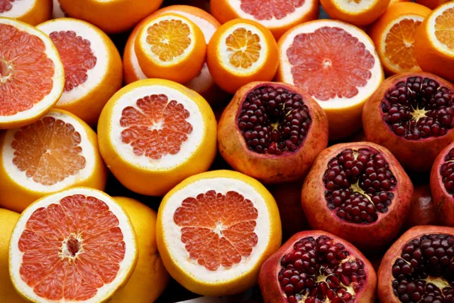 A close up of several different fruits in the same pile